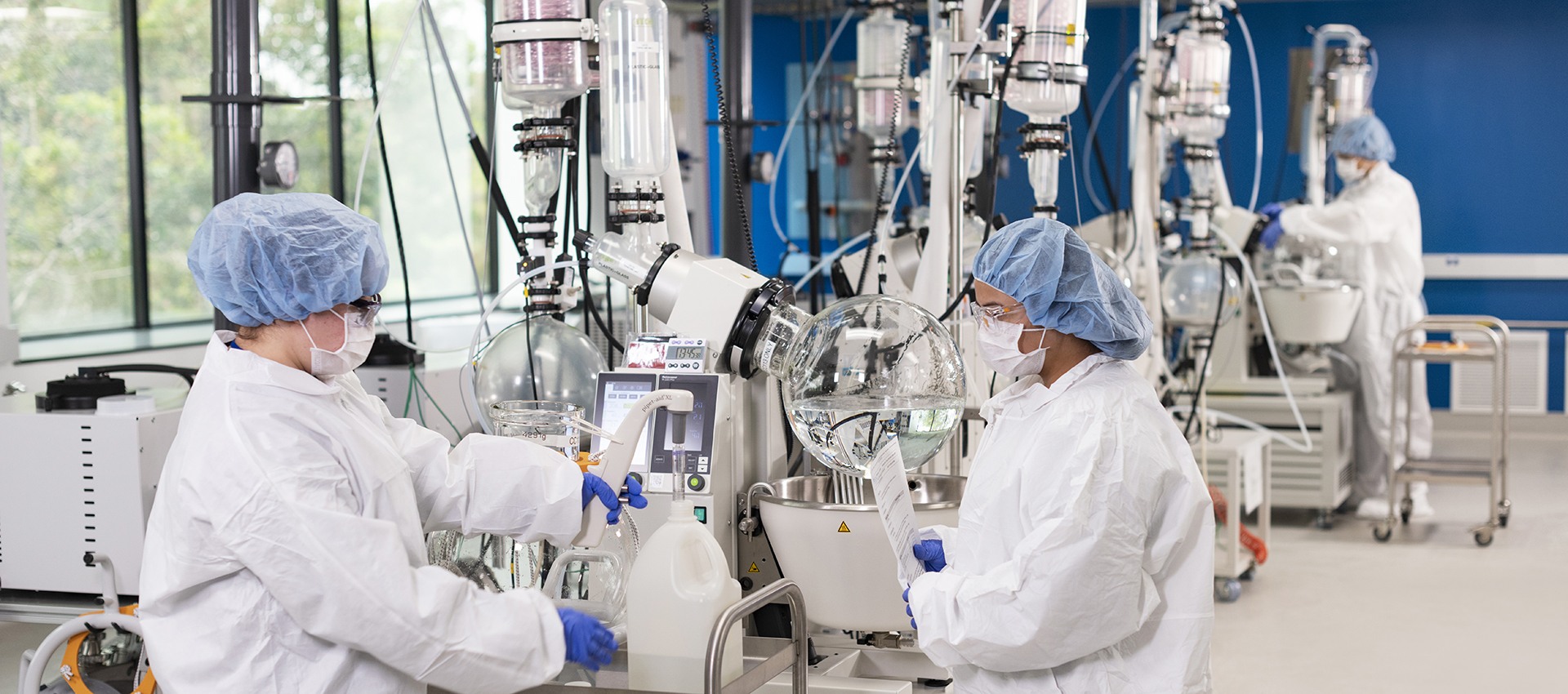 scientists working with lab equipment