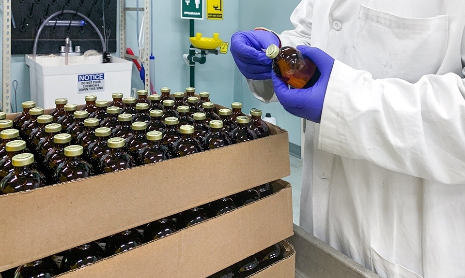 scientist with bottles